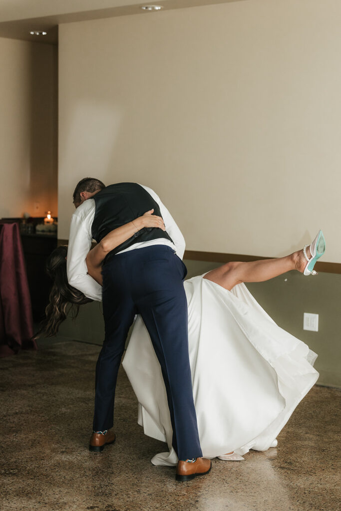 cute portrait of the newlyweds kissing