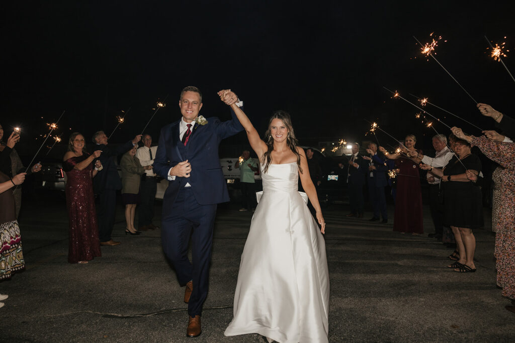 bride and groom arriving at their reception