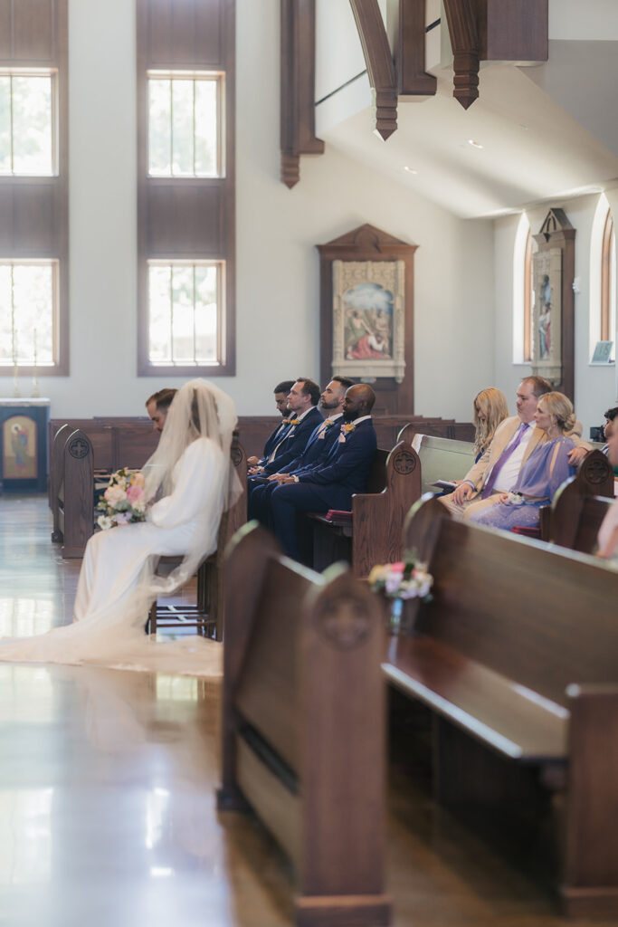 bride and groom holding hands during their ceremony