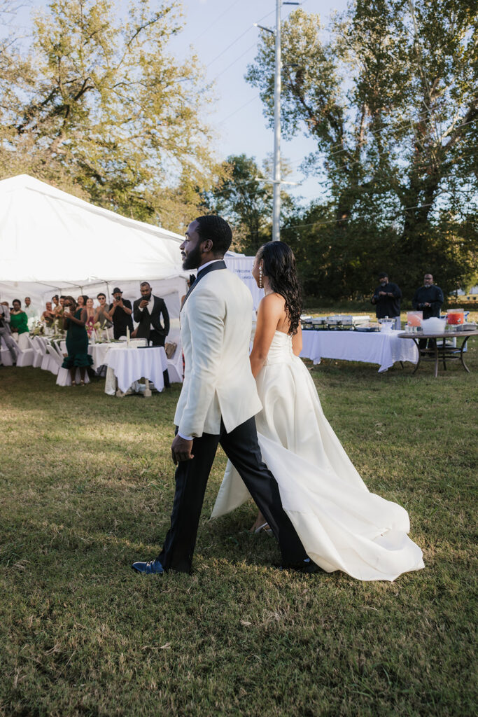 Cute picture of the newlyweds holding hands