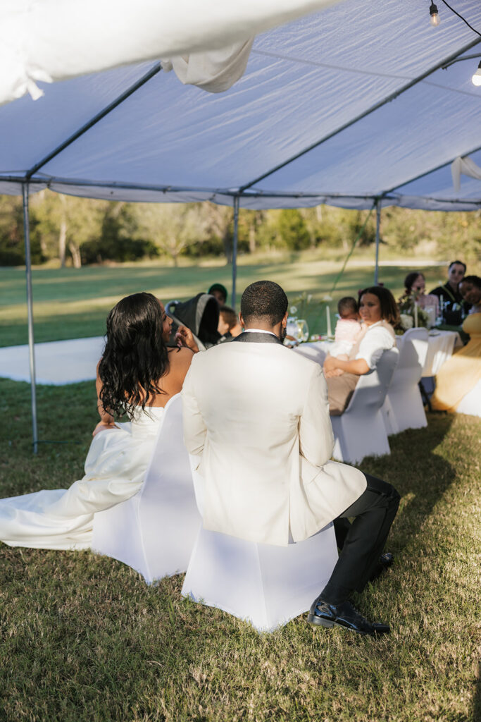 Couple having the best time at their reception