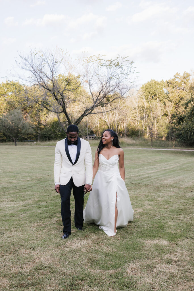 Cute picture of the newly married couple holding hands