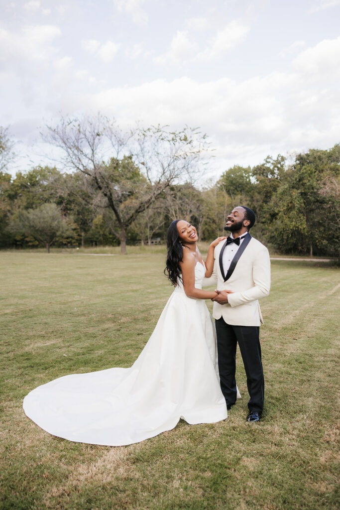 Cute picture of the newly married couple laughing with each other