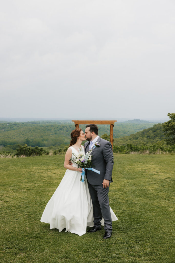 cute picture of the newlyweds kissing