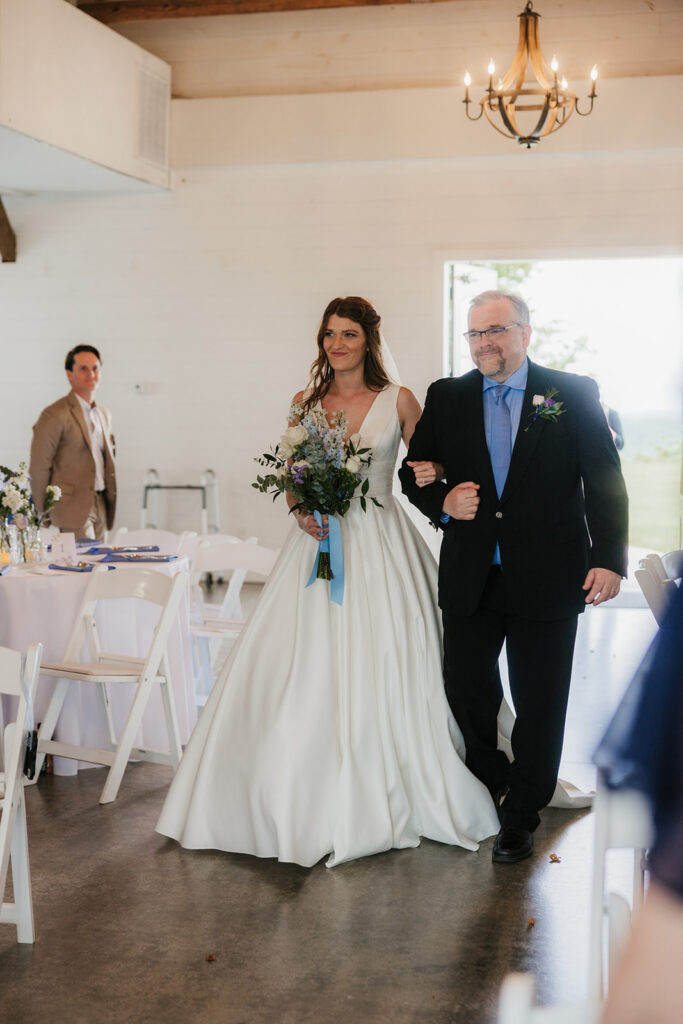 cute picture of the bride walking down the aisle