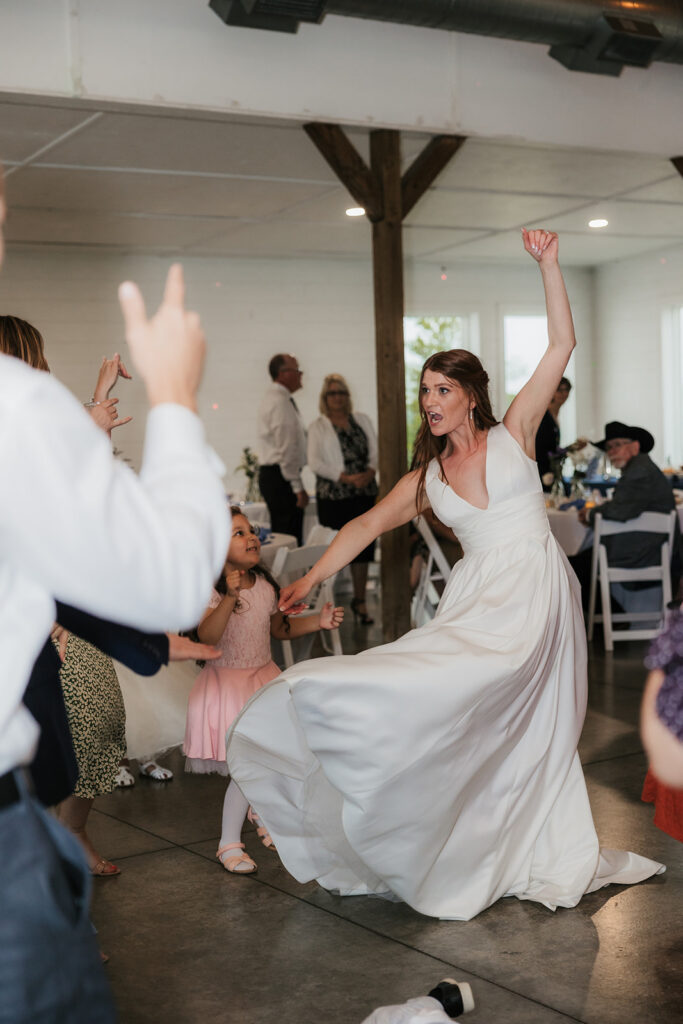 cute picture of the bride dancing at her wedding reception