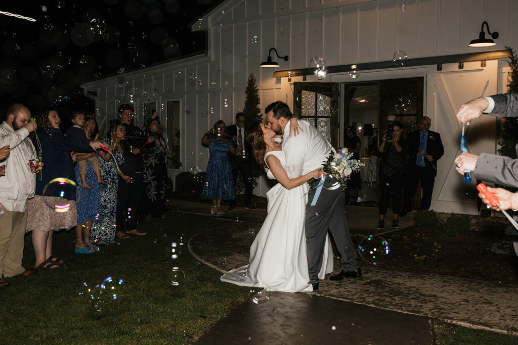 cute portrait of the newlyweds kissing