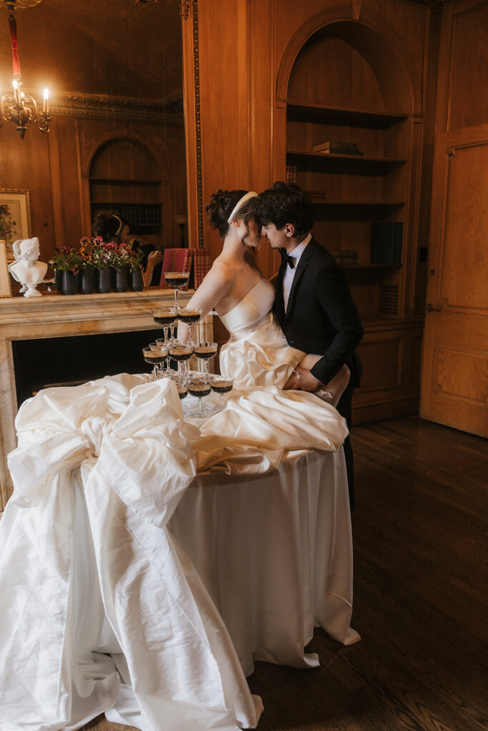 groom kissing the bride on the cheek