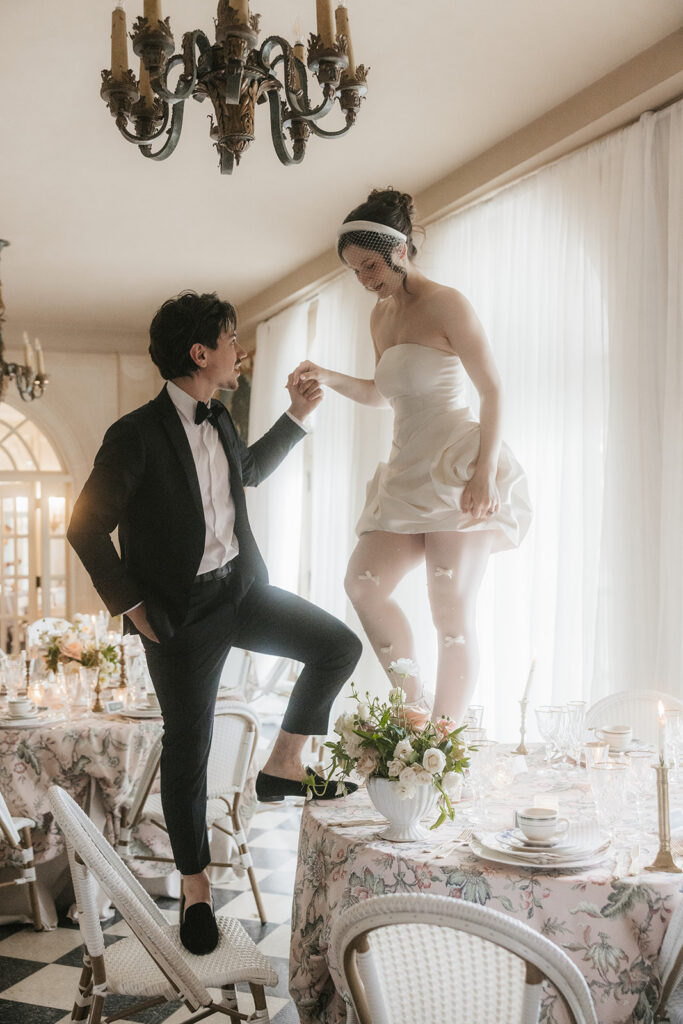 cute picture of the bride and groom holding hands