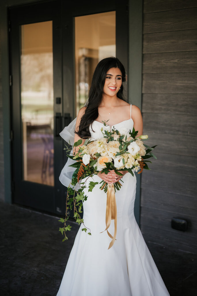 stunning picture of the bride at her dream tulsa wedding