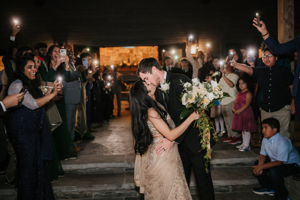 cute picture of the newly married couple kissing