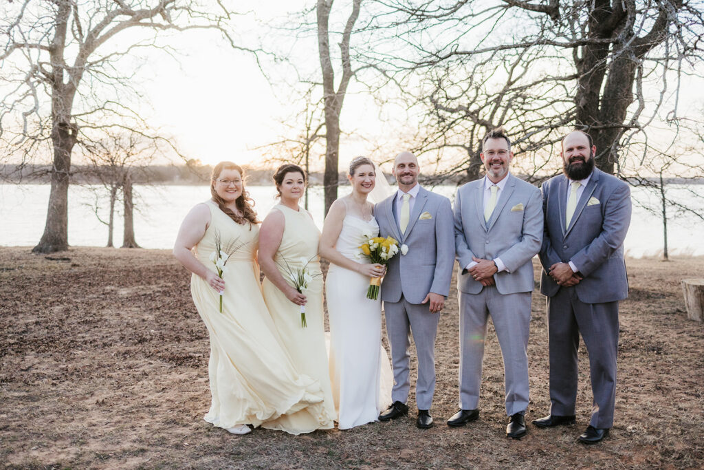 portrait of the bride and groom with their bridal parties