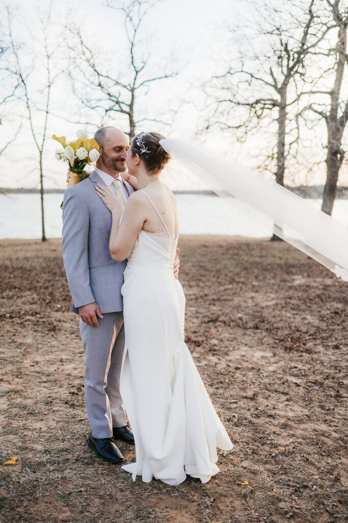 cute picture of the newlyweds kissing