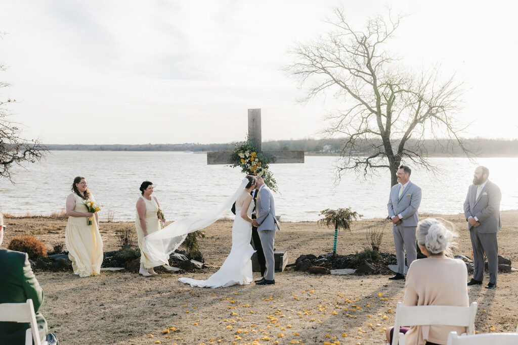 bride and groom kissing after their ceremony