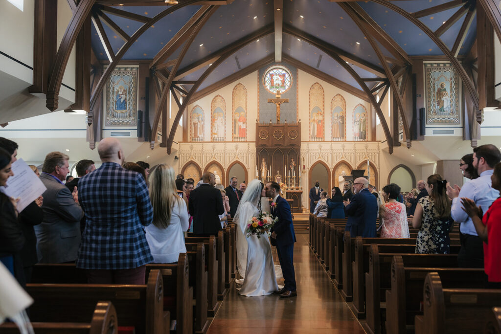 cute picture of the newlyweds heading to their wedding reception