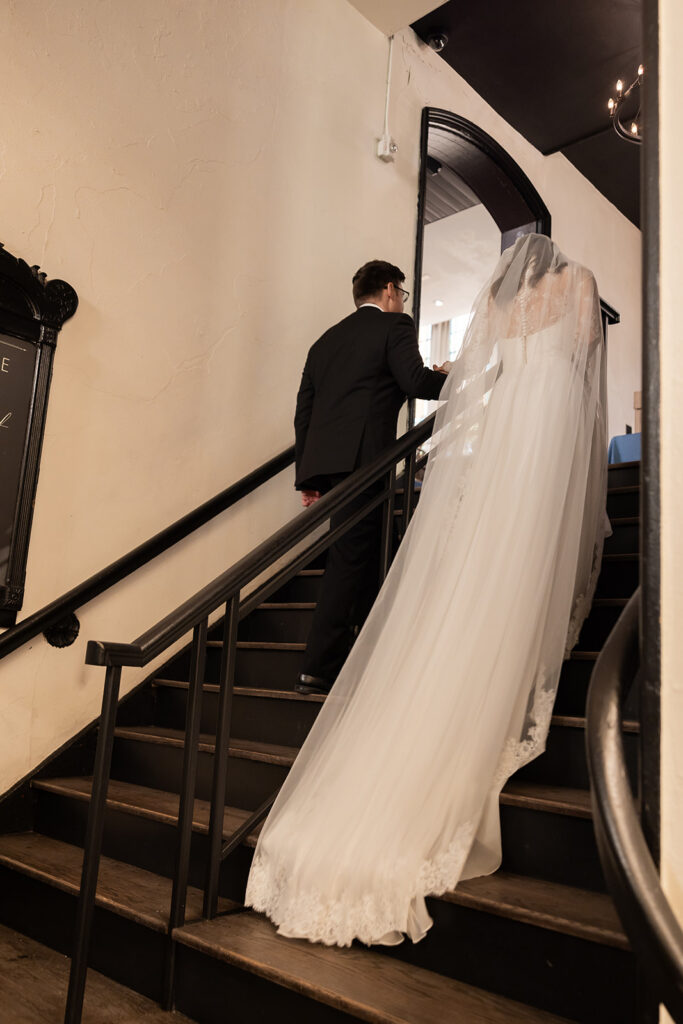 cute picture of the bride and groom holding hands