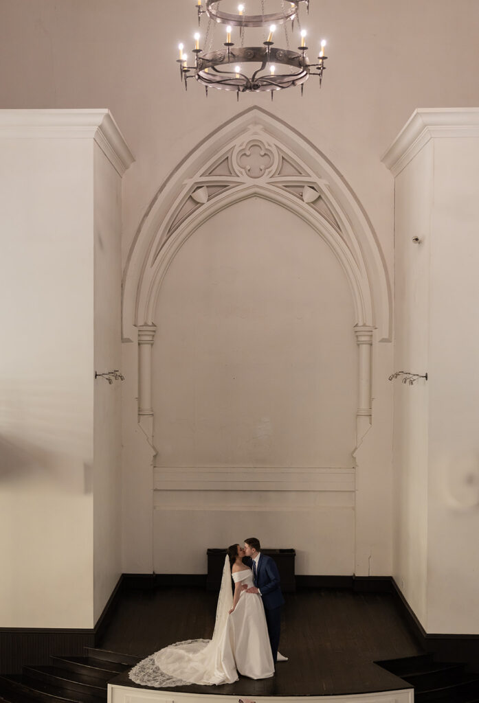cute picture of the newlyweds kissing