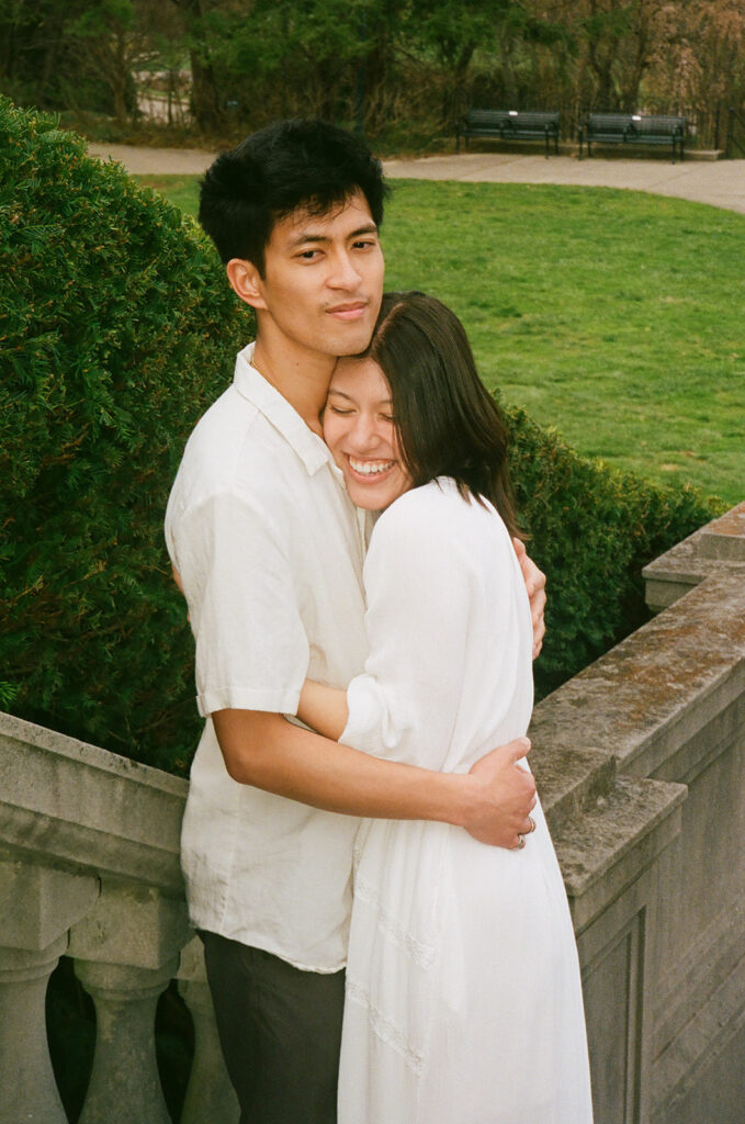 cute picture of the newly engaged couple hugging