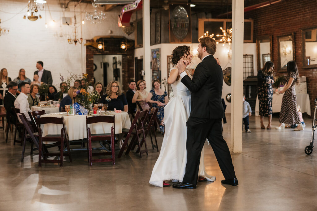 cute picture of the newlyweds dancing at their reception