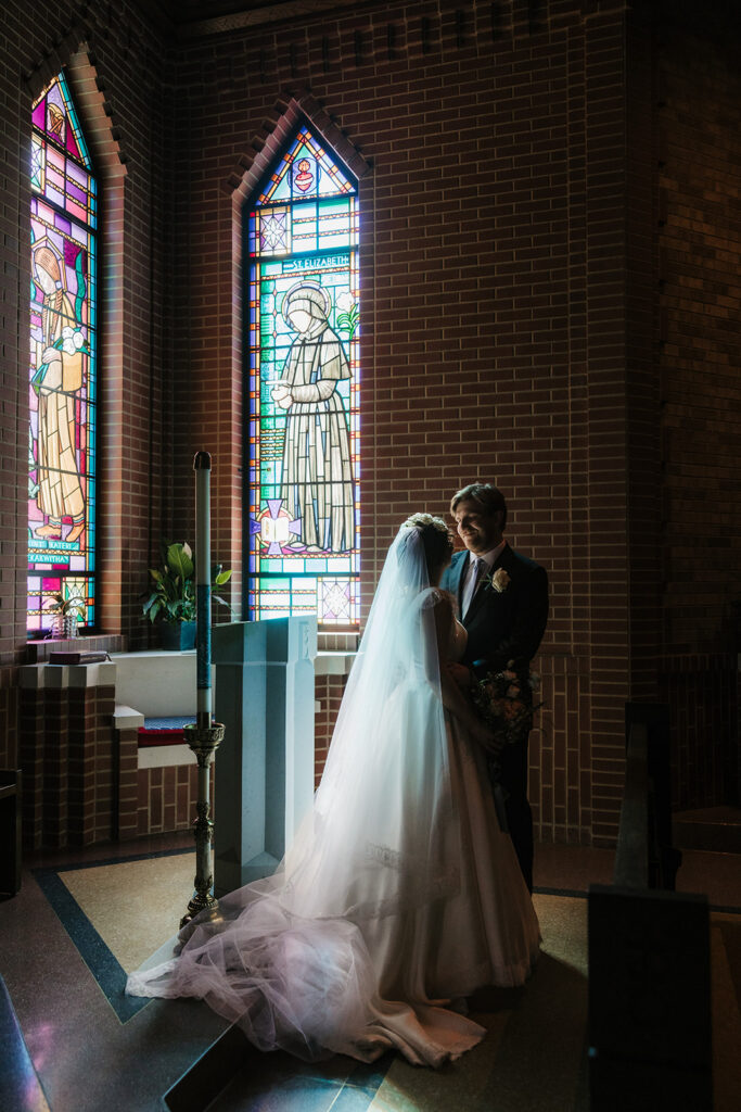 cute picture of the newlyweds smiling at each other
