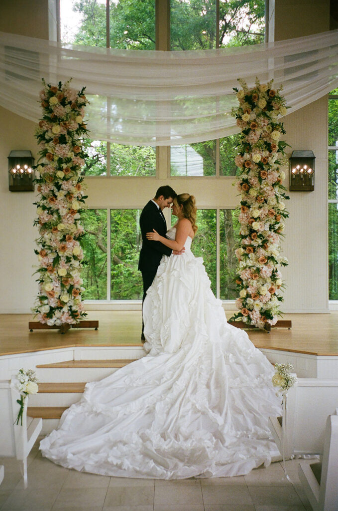 cute picture of the newlyweds smiling at each other