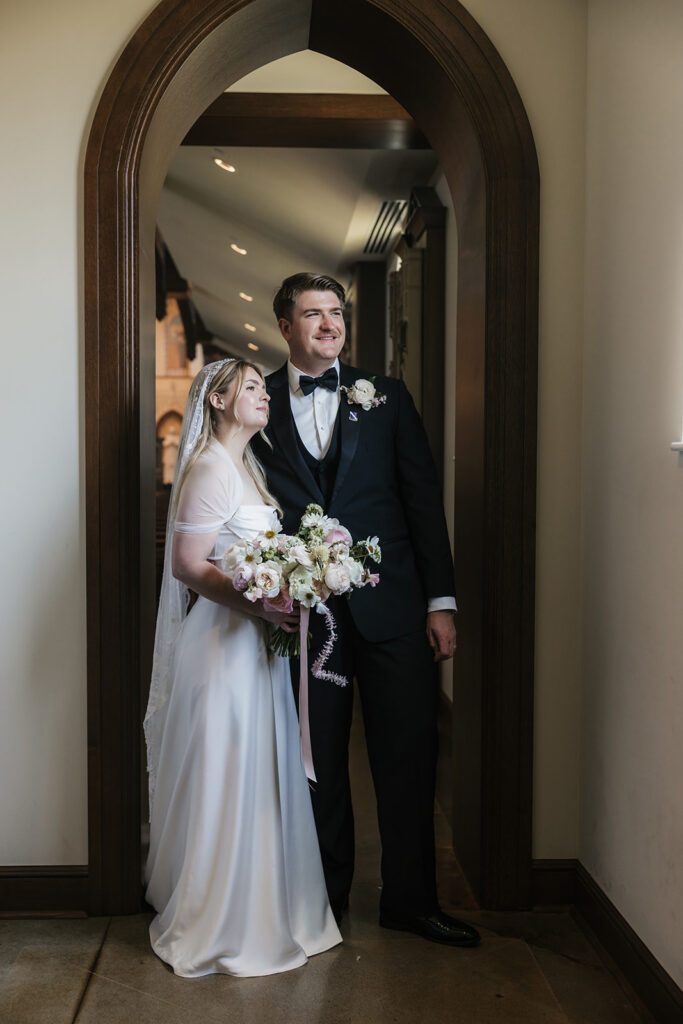 cute picture of the newlyweds smiling at each other