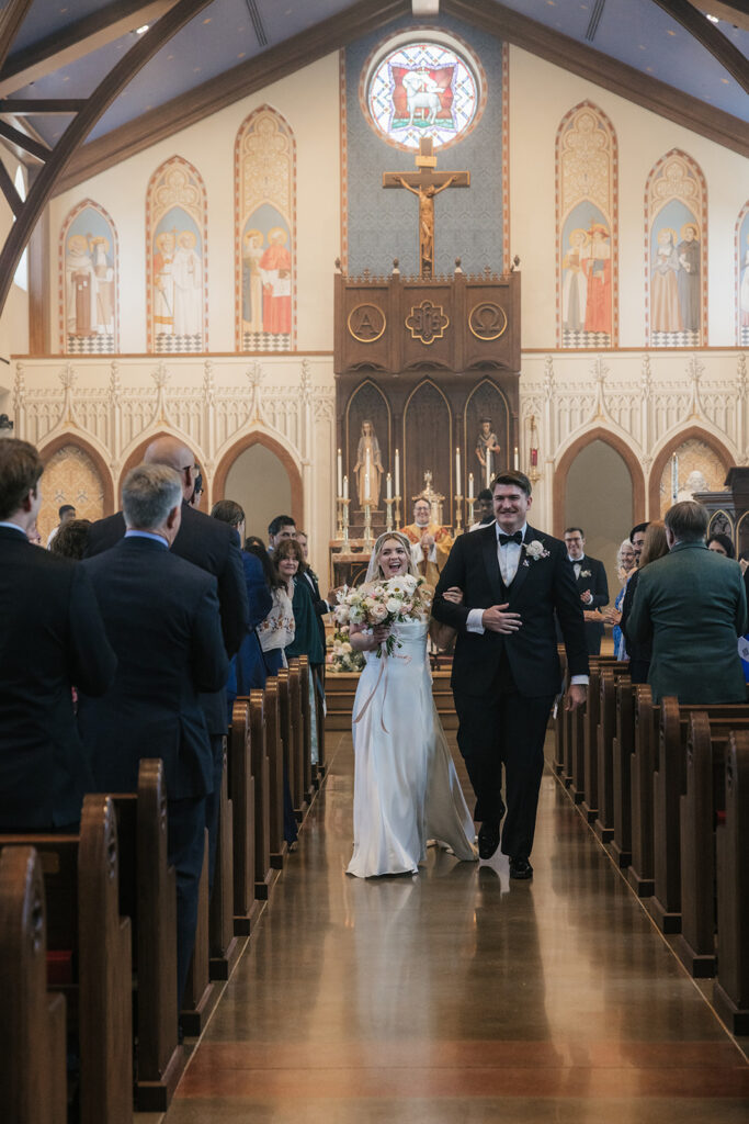newlyweds heading to their wedding reception