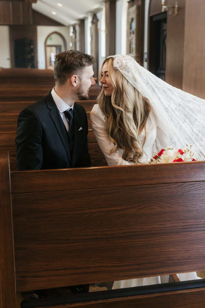 cute picture of the bride and groom smiling at each other