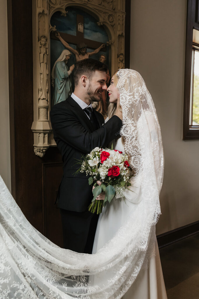 cute picture of the newlyweds smiling at each other