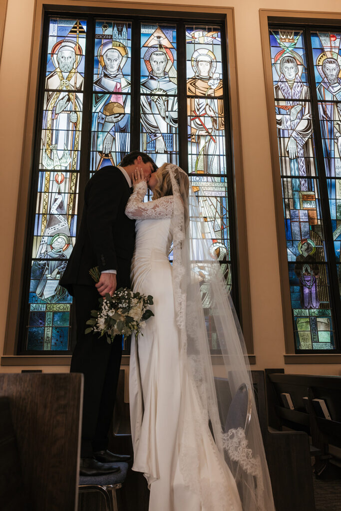 beautiful picture of the newlyweds kissing