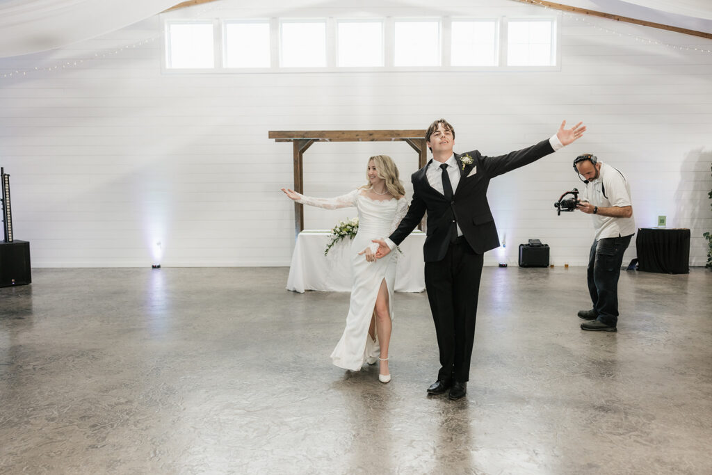 newlyweds arriving at the wedding reception