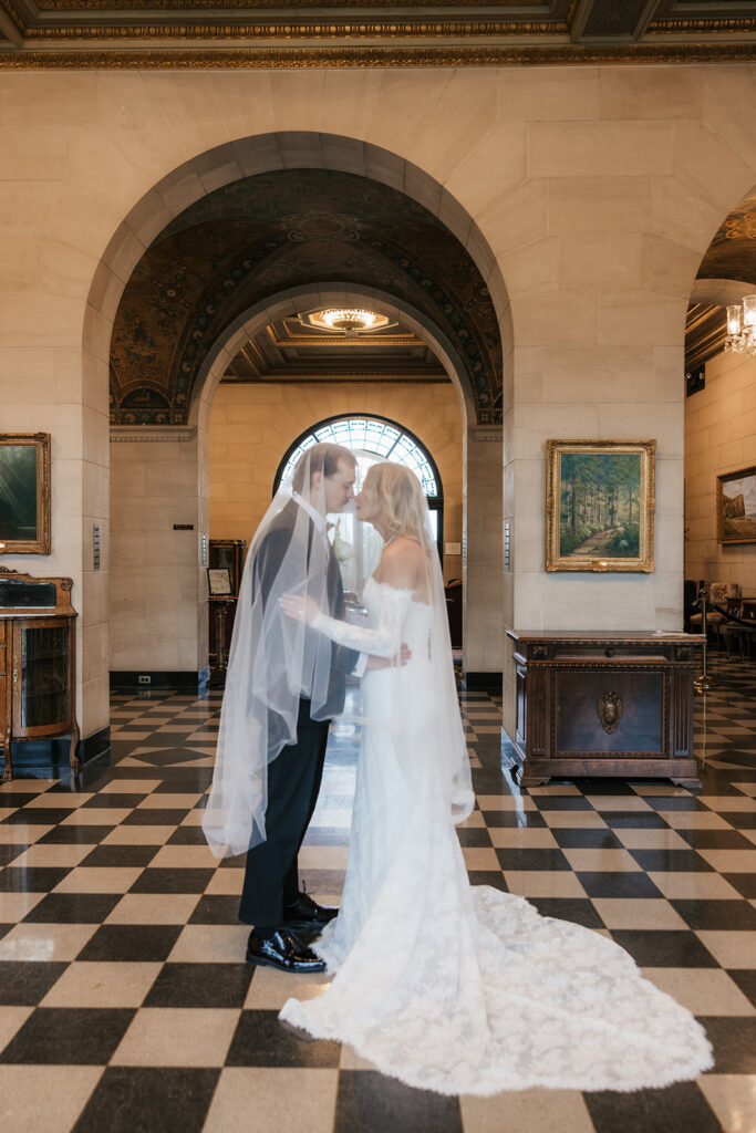 cute picture of the newlyweds smiling at each other