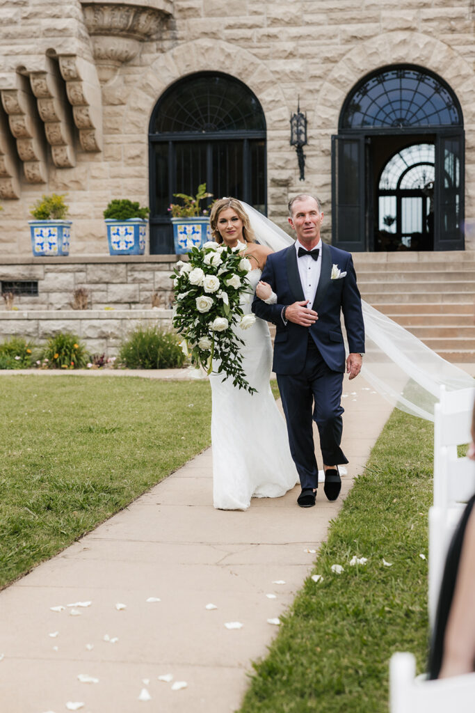 beautiful picture of the bride walking down the aisle