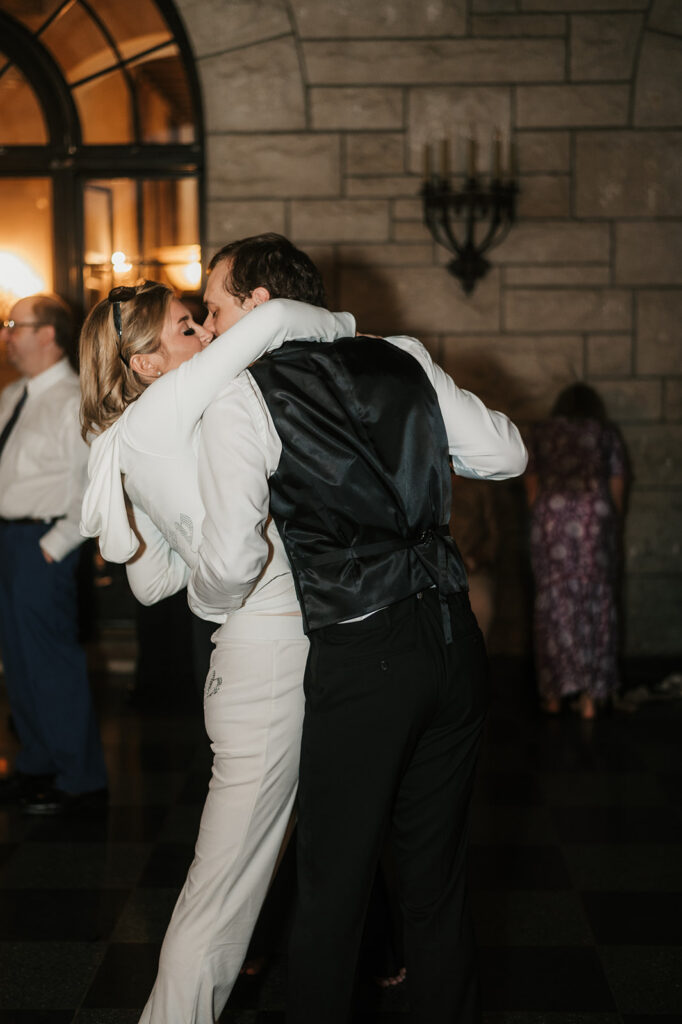 cute picture of the newlyweds kissing