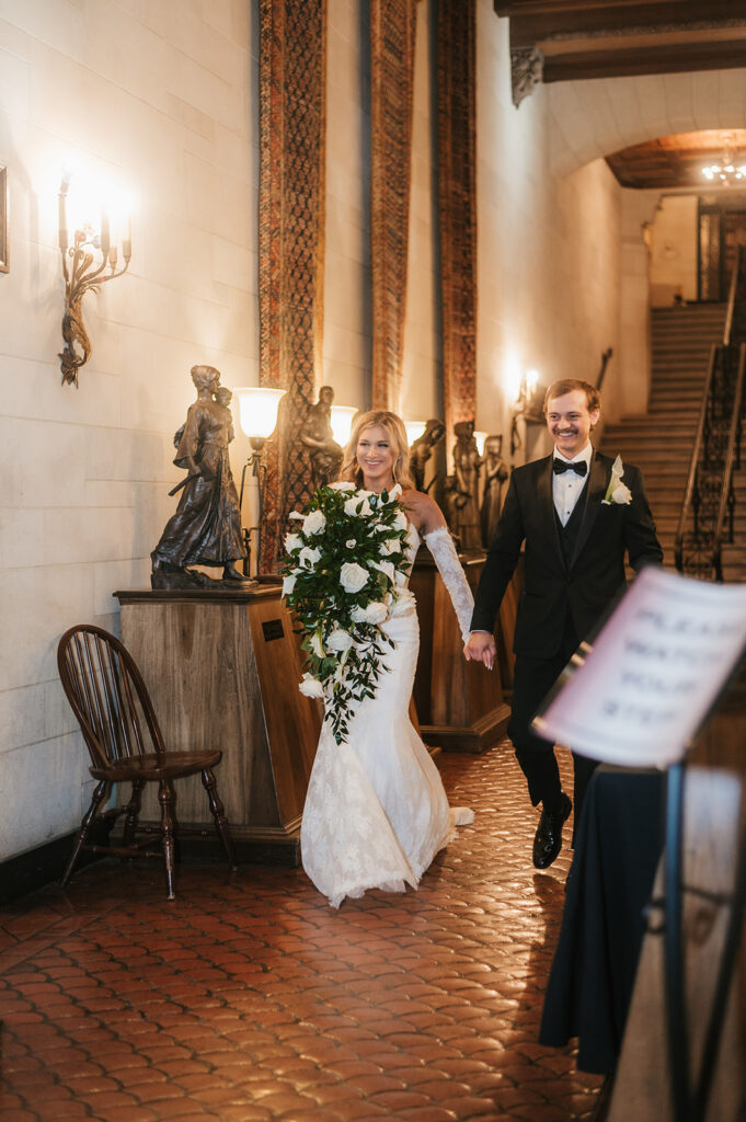 newlyweds arriving at their wedding reception