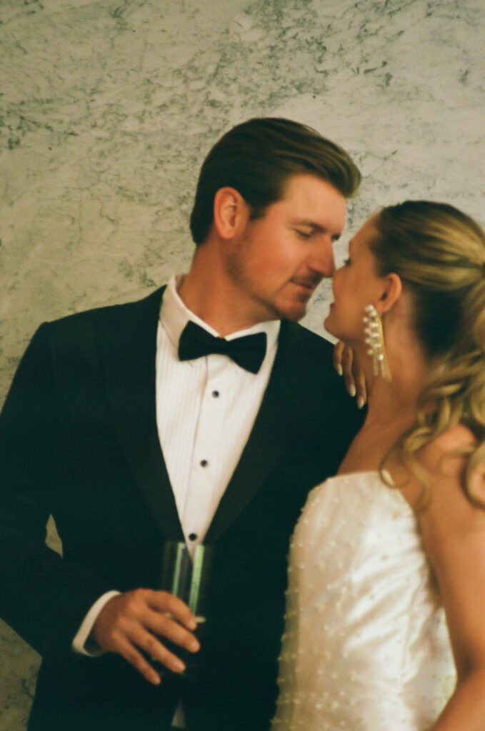 cute picture of the bride and groom smiling at each other