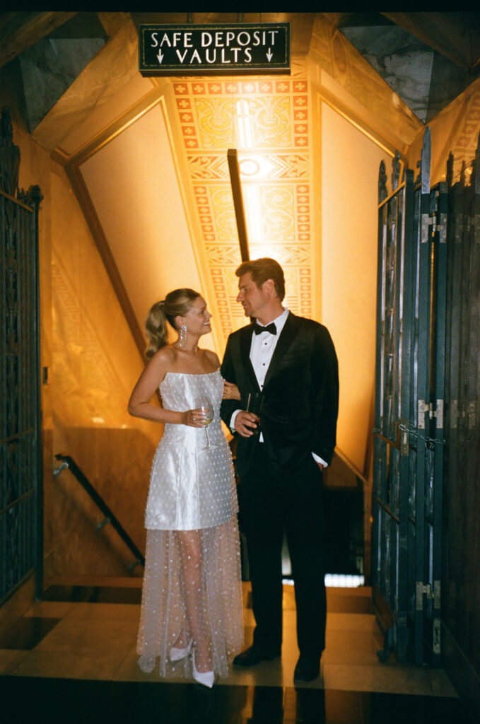 cute picture of the newlyweds laughing with each other during their photoshoot
