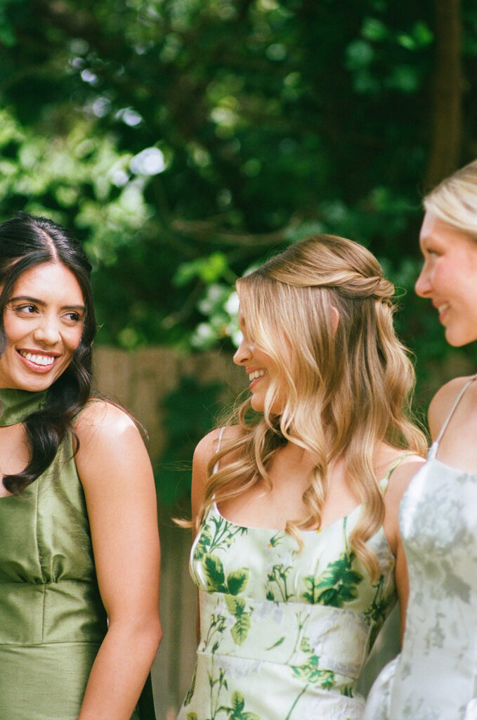 bride and her friends laughing during their brunch