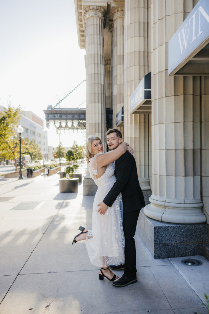 cute picture of the newly engaged couple hugging