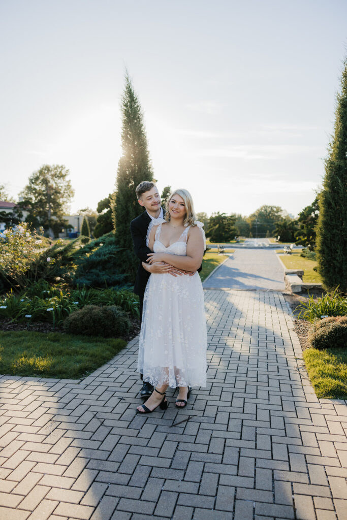 fiance kissing his fiance on the cheek