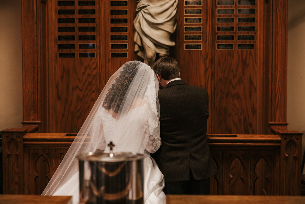 cute picture of the bride and groom hugging