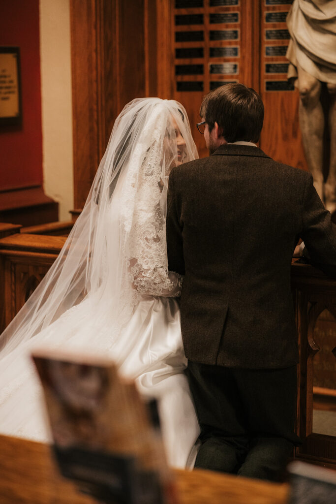 cute picture of the bride and groom smiling at each other
