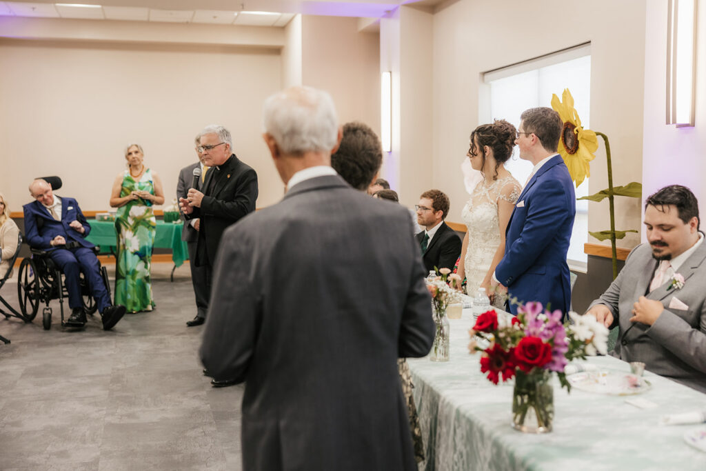 cute picture of the newlyweds at their dream wedding reception