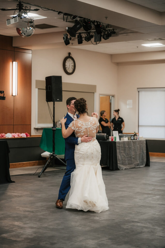 cute picture of the newlyweds dancing at their wedding reception
