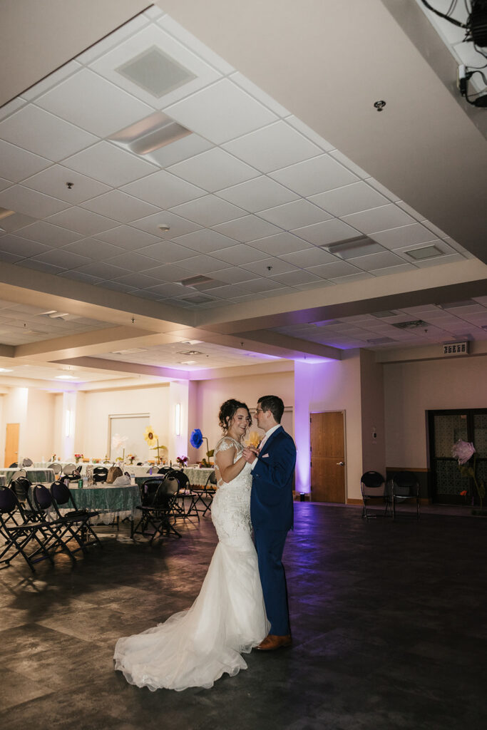 cute picture of the newlyweds dancing at their reception
