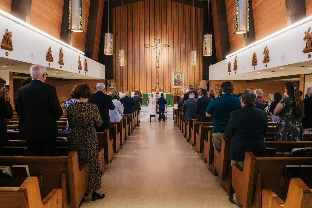 Bride and groom at their Catholic wedding ceremony